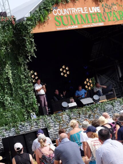 Artificial ivy and foliage walls for hire, dressing a 'Countryfile Live Summer Party' stage with a stone-effect base