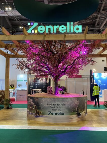 Artificial cherry blossom tree for hire, under a timber pergola on the Zenrelia stand at the London Vet Show